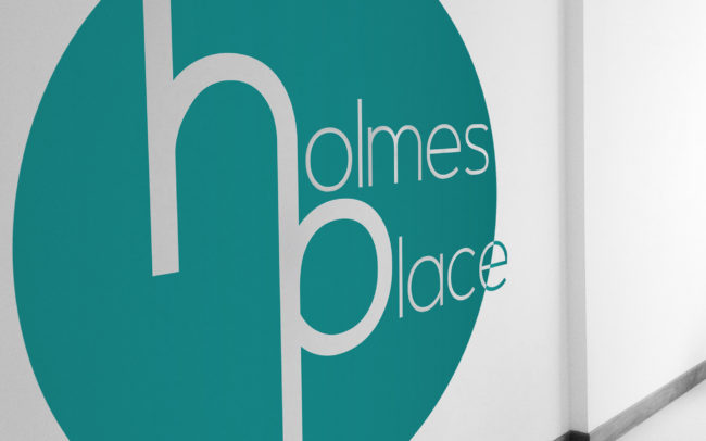 Holmes Place logo on wall