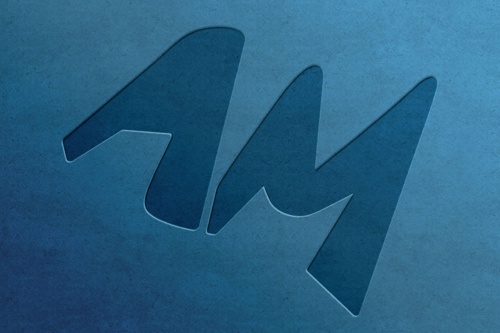 AM Design embossed logo